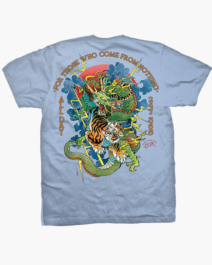 impostor.ro DGK Battle T-Shirt in powder blue, featuring a graphic of a dragon fighting a tiger with lightning and clouds.