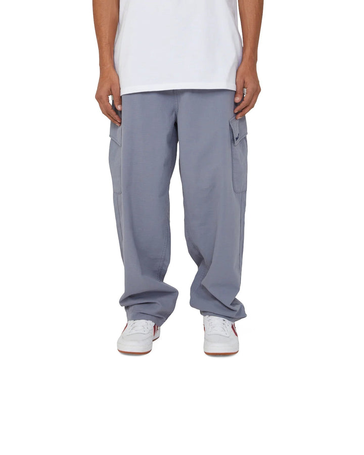 impostor.ro HUF Pretty Baggy Cargos in blue, featuring multiple pockets and a relaxed fit.