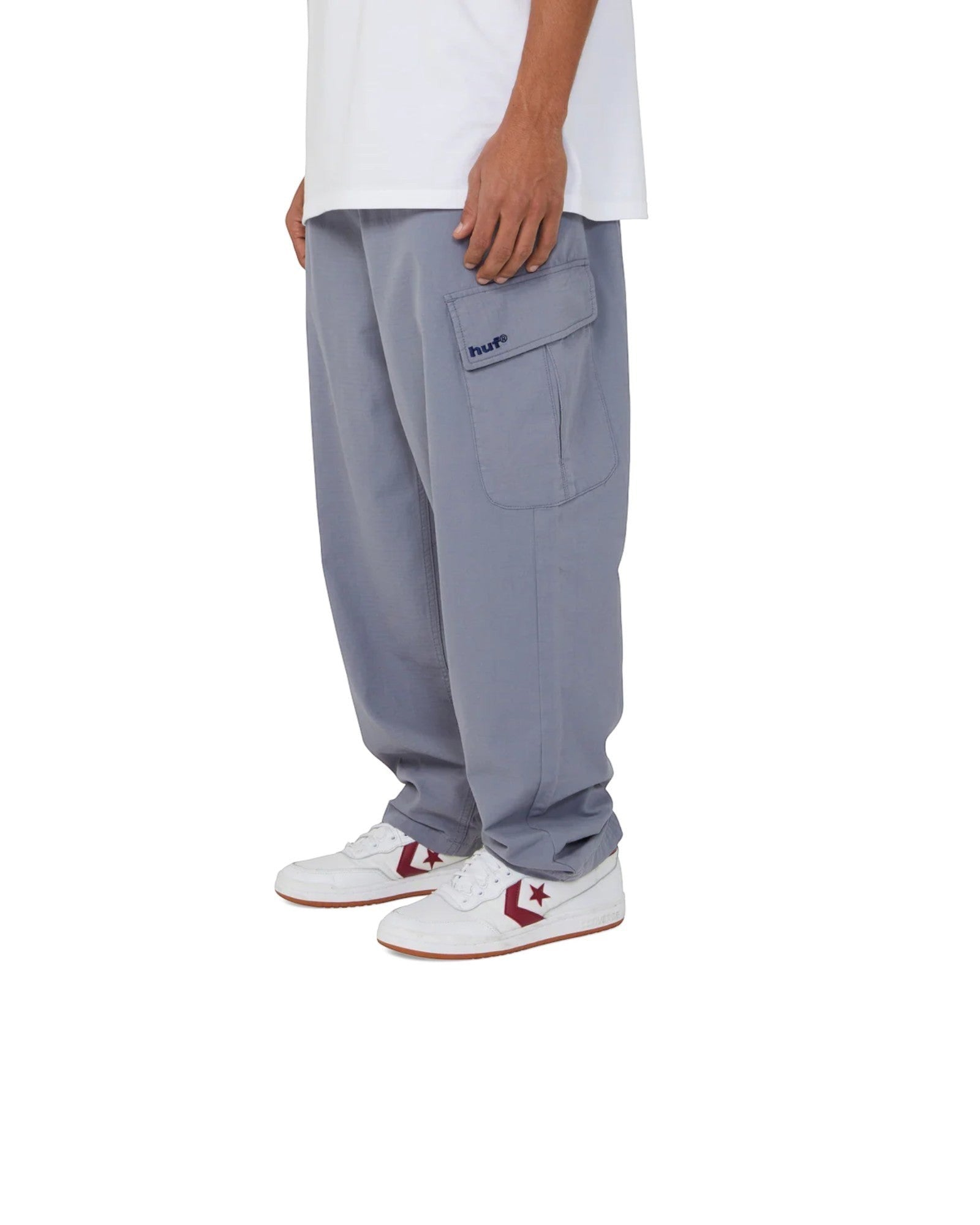 impostor.ro HUF Pretty Baggy Cargos in blue, featuring a relaxed fit and cargo pocket with embroidered logo.