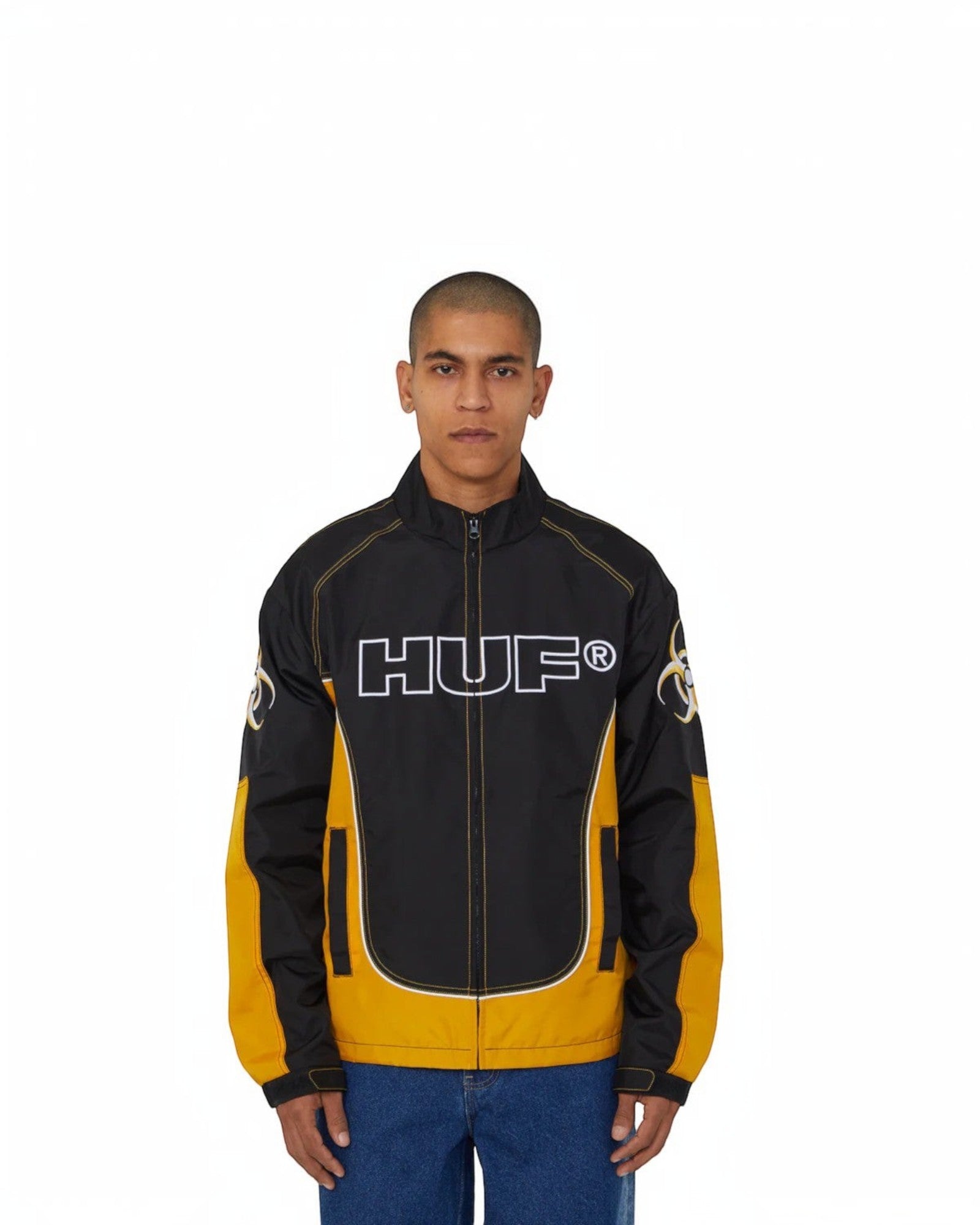 impostor.ro HUF Sector Jacket in black and yellow with large white HUF logo on chest and biohazard graphic on sleeve.