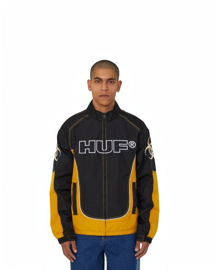 impostor.ro HUF Sector Jacket in black and yellow with large white HUF logo on chest and biohazard graphic on sleeve.