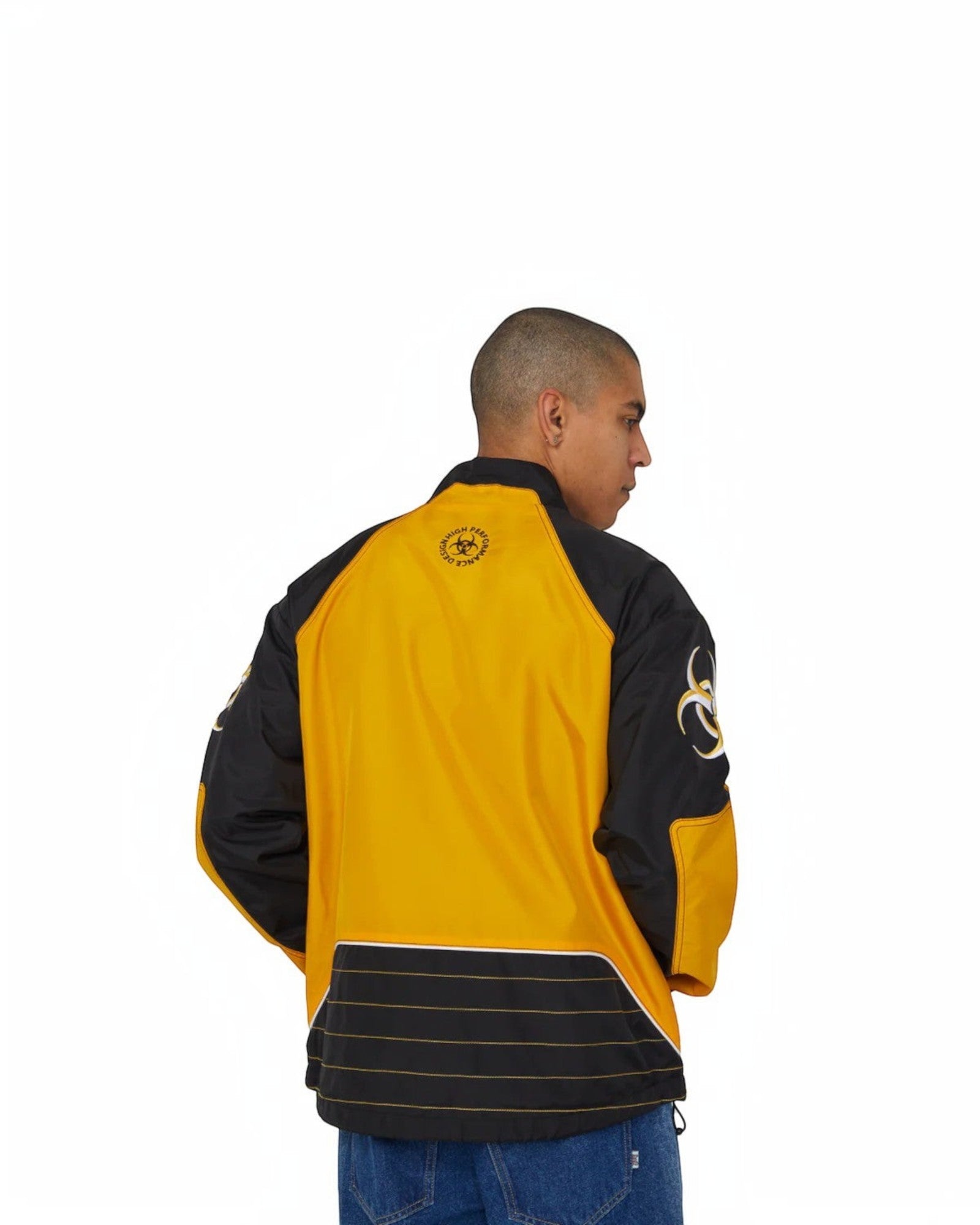 impostor.ro HUF Sector Jacket in black and yellow with biohazard graphic on sleeve and circular logo on back.